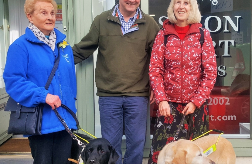 Simon Hart MP takes part in blindfold walk with Guide Dogs Cymru