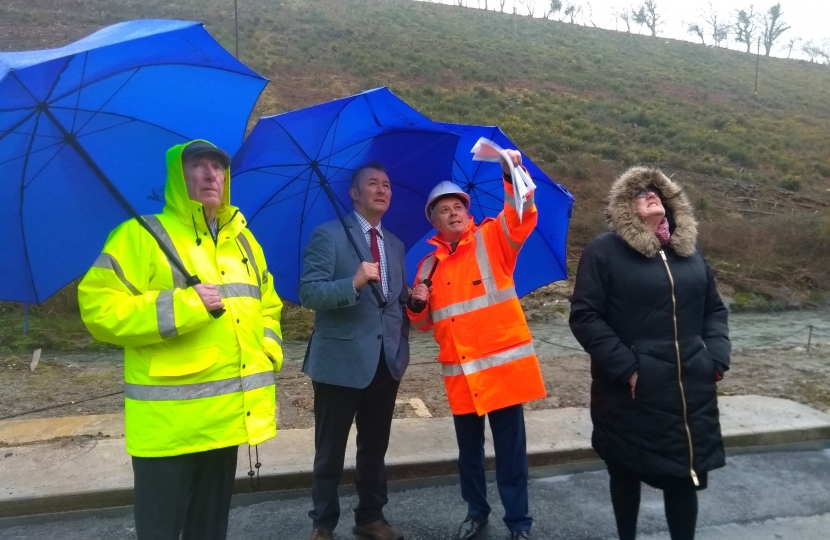 Simon Hart MP inspects the clear up on the A484