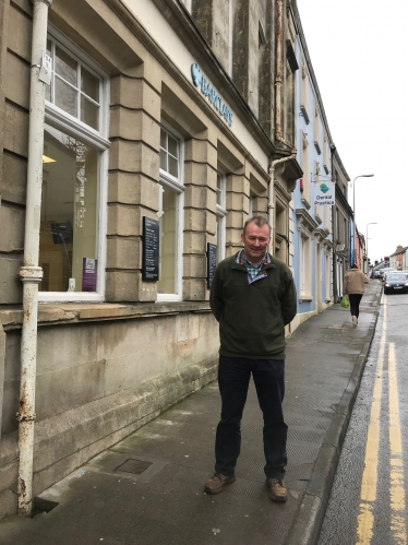 Simon Hart MP outside his local Barclays branch in St James Street Narberth which is closing at the end of June.